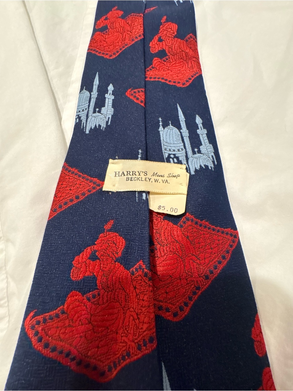 Harry's Navy Tie with Red and Light Blue Motif